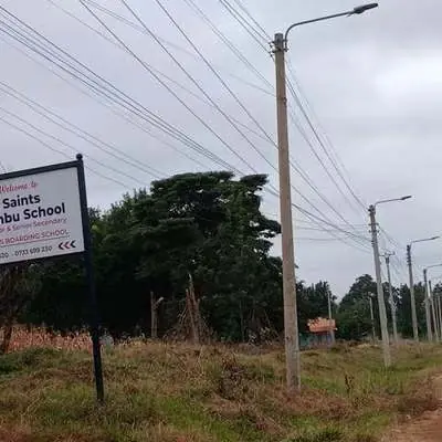 Representative walking the boundary of a plot